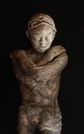 Figure in coffin