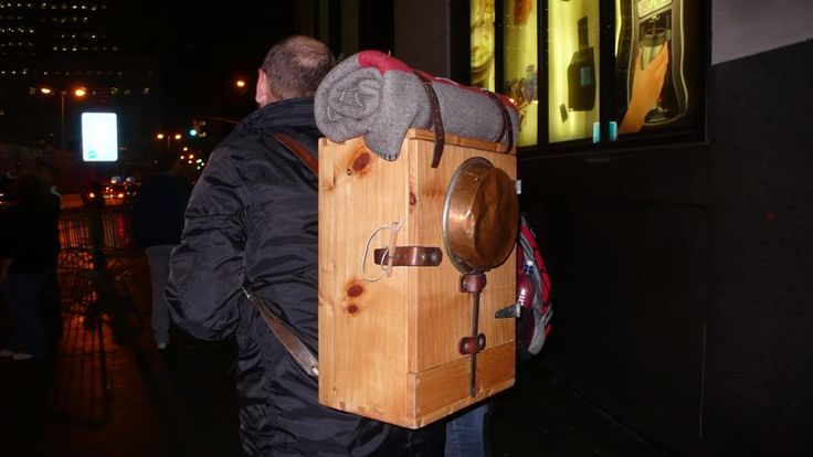 The Man with the Wooden backpack.jpg