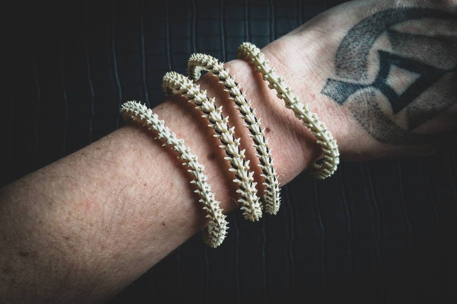 Bone snake design bracer